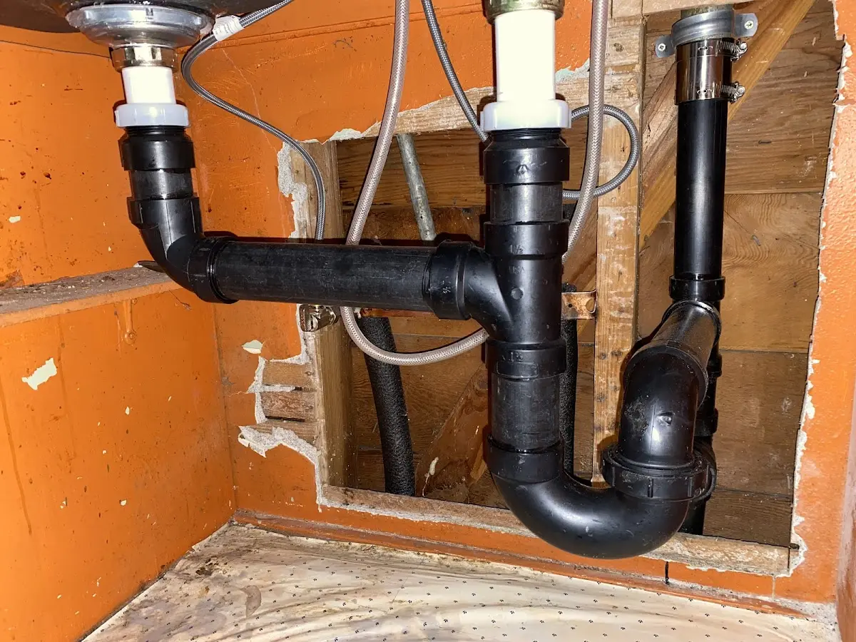 Professional Garbage Disposal Repair equipment and tools on the job in Upper St. Clair